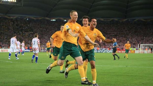 Rock solid ... after scoring a goal from the spot in the last World Cup, Craig Moore will just be happy to help the Socceroos keep clean sheets at the World Cup.