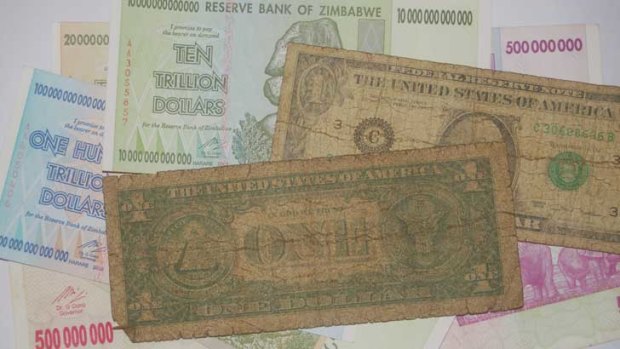 No currency: Dirty, tattered US dollars have replaced the worthless Zimbabwe dollars.
