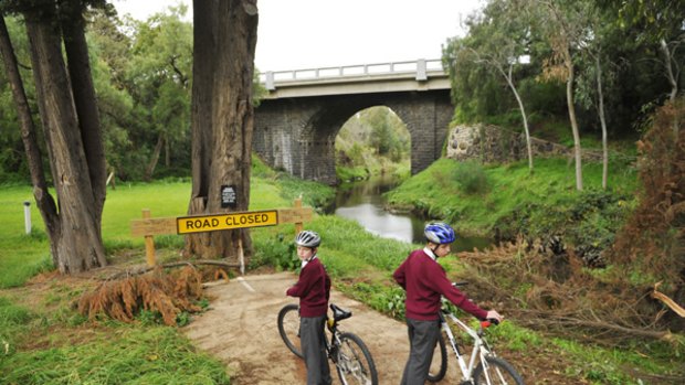 Daniel and James Jones at the end of the Darebin Creek path, beyond which lies private land. 