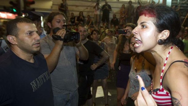 Read my lips &#8230; protesters confront police in Tel Aviv as protests about the high cost of living spread.