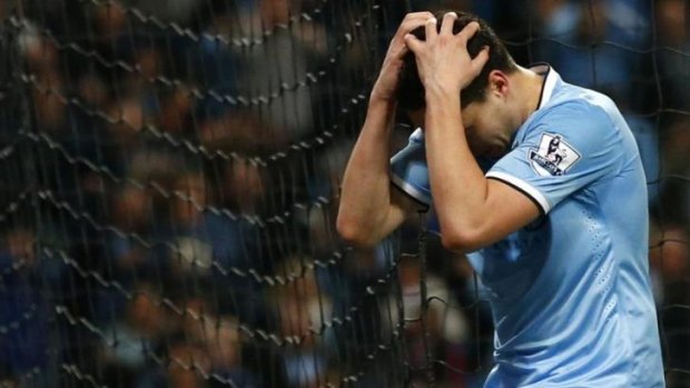 Manchester City's Samir Nasri reacts after spurning a goal-scoring chance against Sunderland.