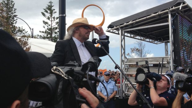 Barry Gibb addresses fans on his arrival.