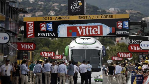 A bus is stuck under the finish gantry on the finish line at the end of the 213 km first stage of the 100th edition of the Tour de France.