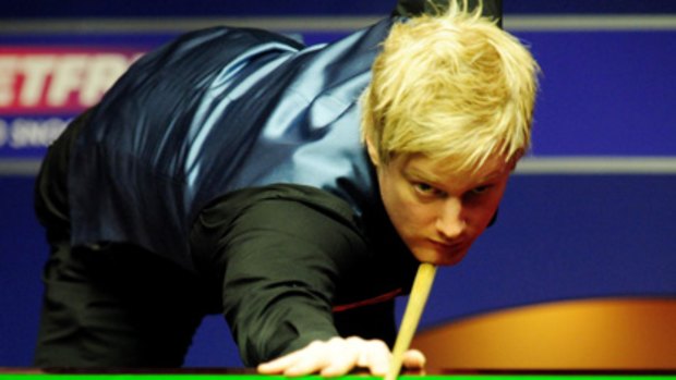 Australia's Neil Robertson lines up a shot during the World Snooker Championships semi-finals.