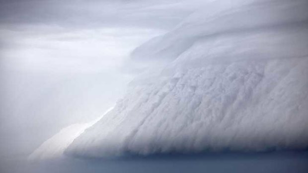 Big and heading for Bondi ... Eugene Tan took this shot of the storm cloud forming over the ocean, with a single yacht,  off Bondi yesterday.
