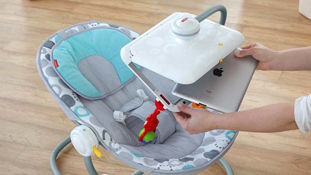 An iPad can be inserted into the Newborn-to-Toddler Apptivity Seat.