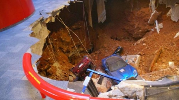 A 12-metre sinkhole opened up under the National Corvette Museum in Kentucky and swallowed eight collector cars.