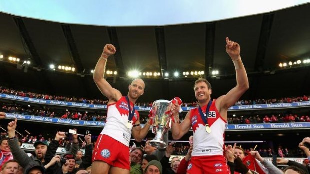 Jarrad McVeigh and Jude Bolton with the 2012 premiership cup.
