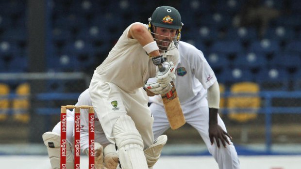 Tough task: Australia's Ed Cowan defends grimly during his innings of 20.