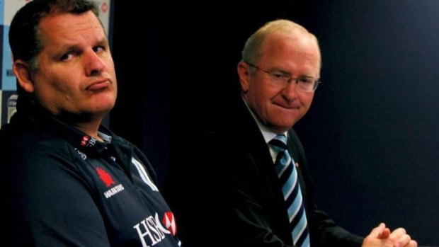 April Fool's: McKenzie faces the media with then Waratahs CEO Jim L'Estrange after his contract was not renewed.