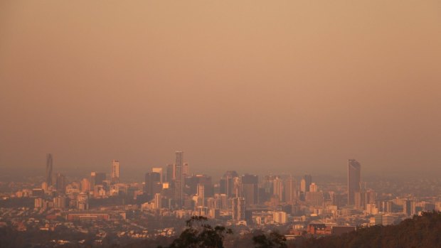 The smoke from the Sunshine Coast bushfire hung over Brisbane on Friday evening.