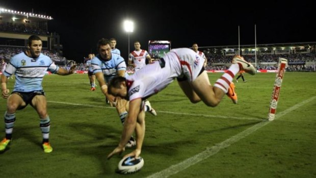 Try of the year?: Brett Morris scores an amazing try against the Sharks on Saturday night.