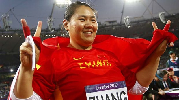 Going early .... China's Zhang Wenxiu celebrates after initially thinking she'd won the bronze medal.