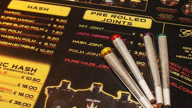 Pre-rolled joints are seen on an english language menu listing the variety of hash and marijuana on sale at a coffee shop in Amsterdam, Netherlands. The new Dutch government has scrapped a planned "weed pass" designed to keep foreigners out of the nation's cannabis-selling coffee shops.