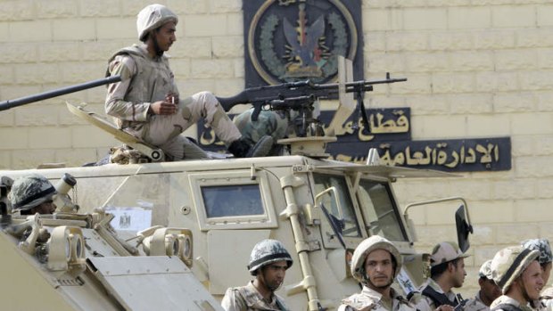 Egyptian army soldiers guard Torah Prison, where ousted President Hosni Mubarak is being held. The former leader could be released from the prison as early as Thursday.