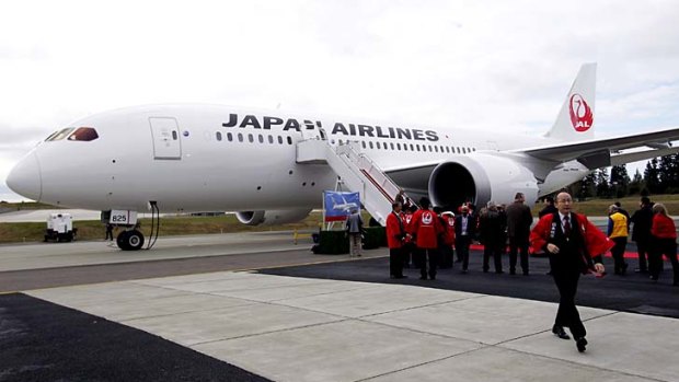 The first of two 787 Dreamliner jets is delivered to Japan Airlines (JAL) at Boeing's Paine Field in Everett, near Seattle.