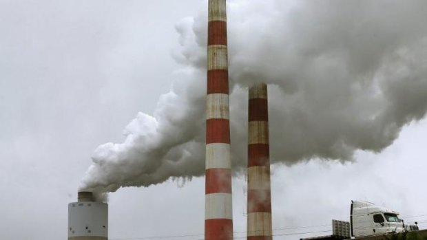 Under pressure to change ... Emissions spew out of a coal-fired power station in Maryland.