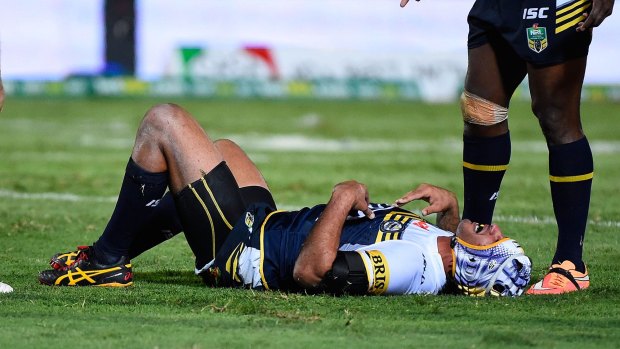 Bruised and battered: North Queensland playmaker Johnathan Thurston on Saturday. 