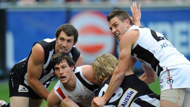 Travis Cloke, Farren Ray, Dale Thomas and Sam Fisher give no quarter.