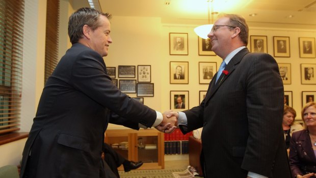 Opposition Leader Bill Shorten congratulates David Feeney after he joined the Labor Party caucus in 2013. 