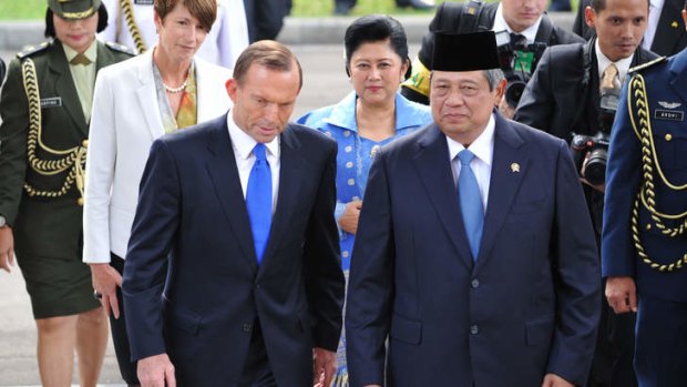 Happier times: Prime Minister Tony Abbott with Indonesia's President Susilo Bambang Yudhoyono during a visit to Jakarta in September. Mr Abbott has delivered a stern message to the president over Australia's asylum boat policy.