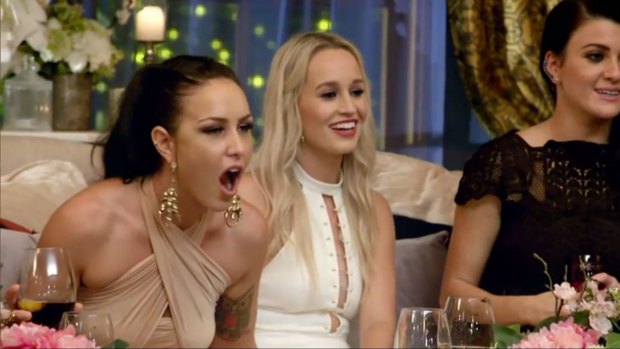 Sian's reaction when Laura returned with a rose.