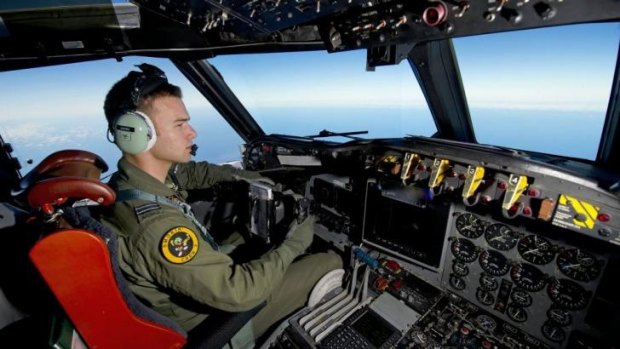 RAAF pilot Flight Lieutenant Russell Adams flies his AP-3C Orion over the Southern Indian Ocean.