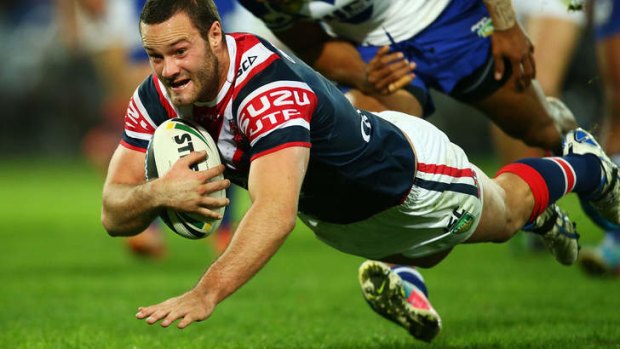 Busy night: Boyd Cordner dives in to score.