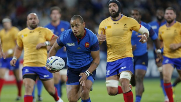 Second win: France's Gael Fickou runs with the ball against Romania. 