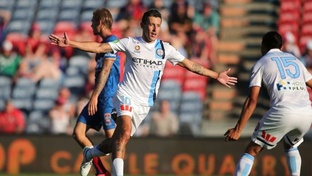 Land of the three: Robert Koren of Melbourne City celebrates his first of three goals against Newcastle. 