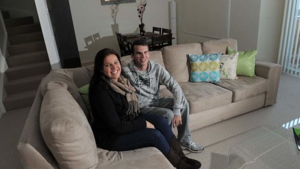 Queanbeyan couple, Nathan Buckley and his wife Tanya Heydon in their apartment. They are hoping to buy land and build a home in Googong.
