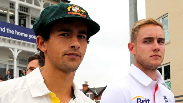 Never let a chance go by: Stuart Broad watches as Ashton Agar walks on to the pitch at Trent Bridge.