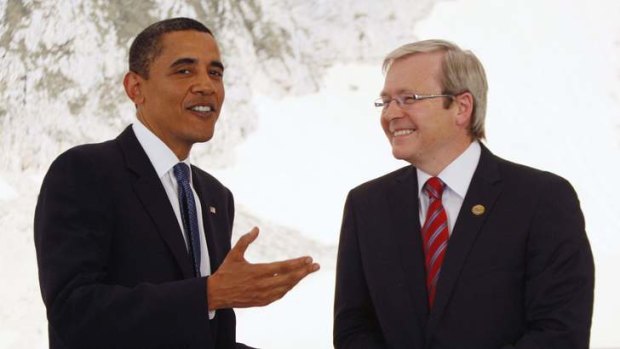 US President Barack Obama speaks with Kevin Rudd at a G8 summit in Italy, 2009.