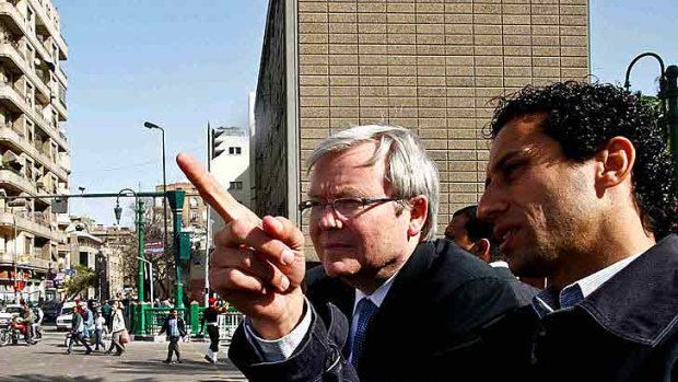 Kevin Rudd talks to Egyptian activisit Alfred Raouf in Cairo's Tahir Square last month.