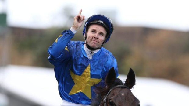The special one: Tommy Berry looks to the skies after winning aboard The Offer nine days after the death of his twin brother Nathan.