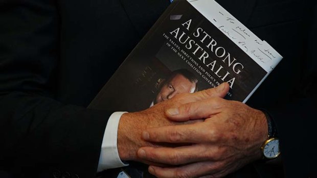 No such thing as a free launch ... Tony Abbott with his new book, A Strong Australia.