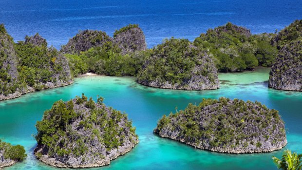 Limestone islets and tropical lagoon in the Raja Ampat islands, West Papua.