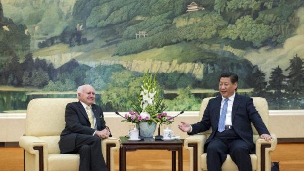 Former Australian prime minister John Howard (left) meets with Chinese President Xi Jinping in Beijing on Wednesday.