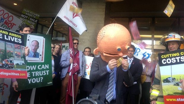 Uunion members protest the $57,000 pay rise granted to MPs.