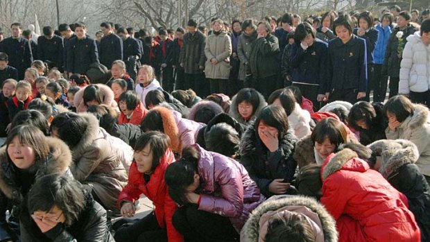Outpouring of grief ... North Korean women cry for Kim Jong-il.
