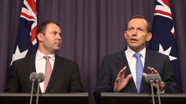 Prime Minister Tony Abbott and Parliamentary Secretary to the Prime Minister Josh Frydenberg will look at winding back gender reporting laws after the current round of legislation.