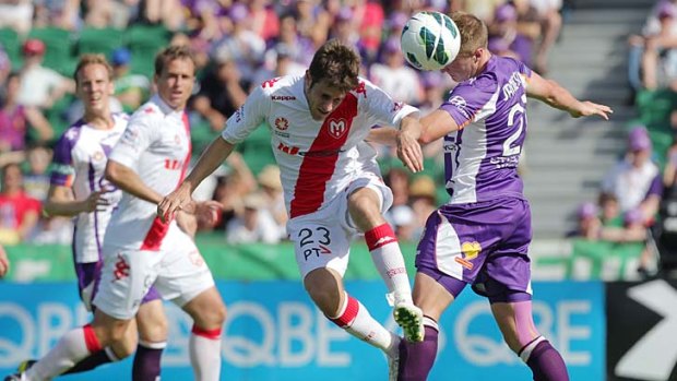 Mate Dugandzic of the Heart heads the ball during the round three A-League match between Perth Glory and the Melbourne Heart at nib Stadium.