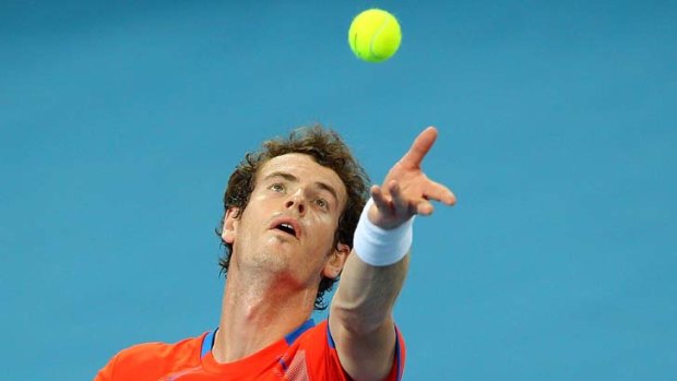 High ... Andy Murray serves at this year's Brisbane International.