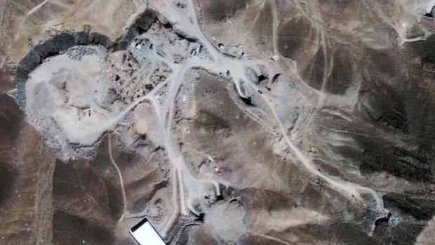 High-level view  ... an image from 2009 of a suspected nuclear enrichment facility under construction inside a mountain located about 30 kilometres north-northeast of Qom, Iran.