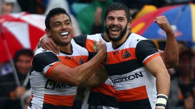 Huge payday: Wests Tigers' Canberra-bound fullback James Tedesco (right).