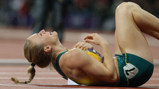 Overcome with emotion ... Australia's Sally Pearson wins gold.