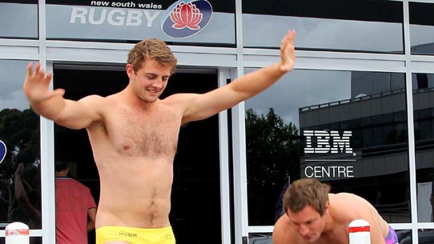 Cold play ... Waratahs stars Dean Mumm and Nathan Trist prepare to Strut the Streets.