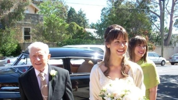Melissa Singer (centre) spent $3000 on her wedding gown but would do things differently second time around.