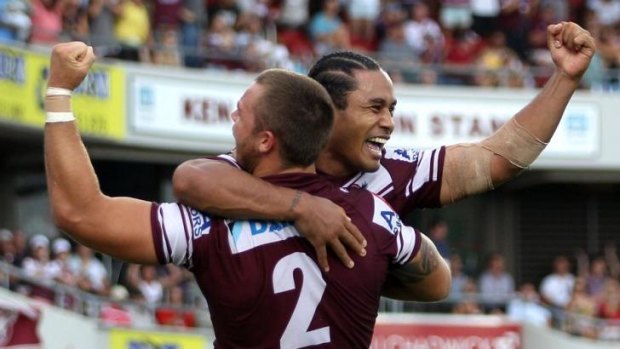 Eagle rock: Steve Matai celebrates the winning try for Manly against Parramatta on Sunday.