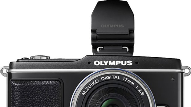 Olympus PEN E-P2: sweet compromis between size and quality.